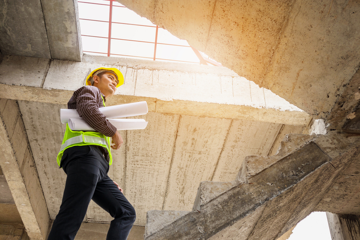 professional engineer worker at the house building construction site